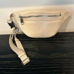 Authentic Gucci GG embossed belt bag